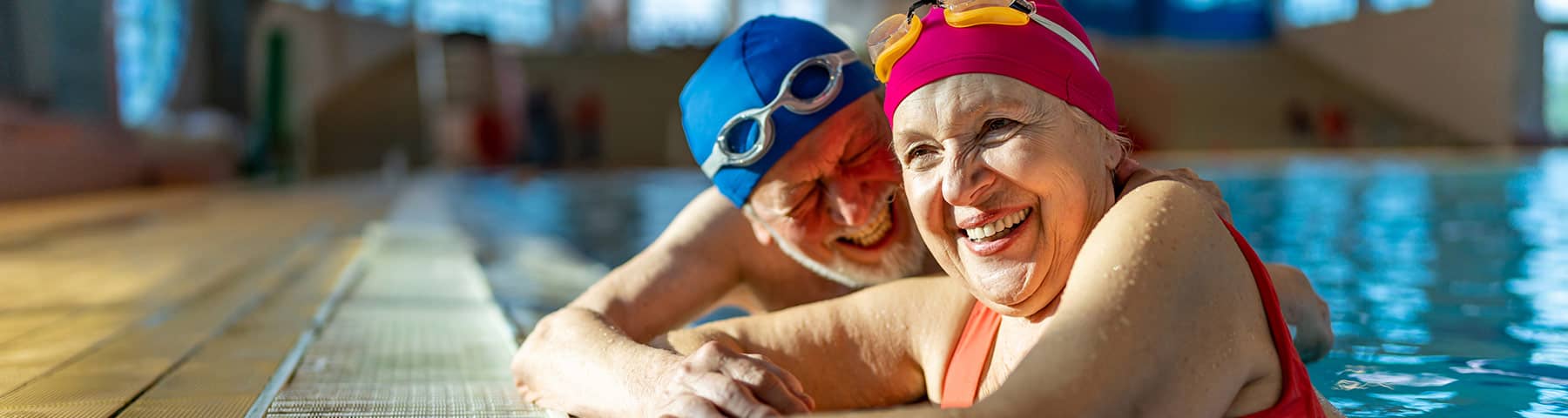 Elderly couple in a swimming pool